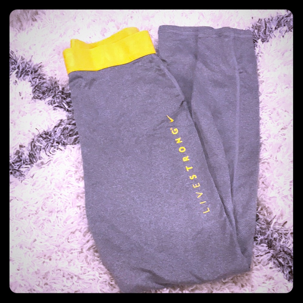 Small running tights by Nike live strong